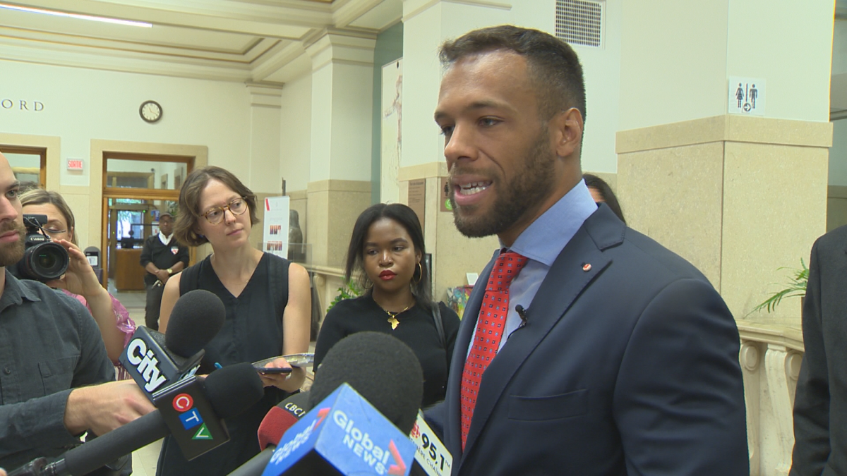 Balarma Holness talks to reporters  at city hall after announcing that the city of Montreal will be holding public consultations on systemic racism and discrimination. Friday, Aug. 17, 2018.