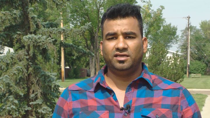 An Edmonton man has shared a video he took that shows a woman shouting racist comments at him over a parking dispute.