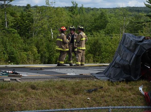 Emergency crews attend a serious crash along Nova Scotia's Highway 102 on Tuesday, August 21, 2018. 