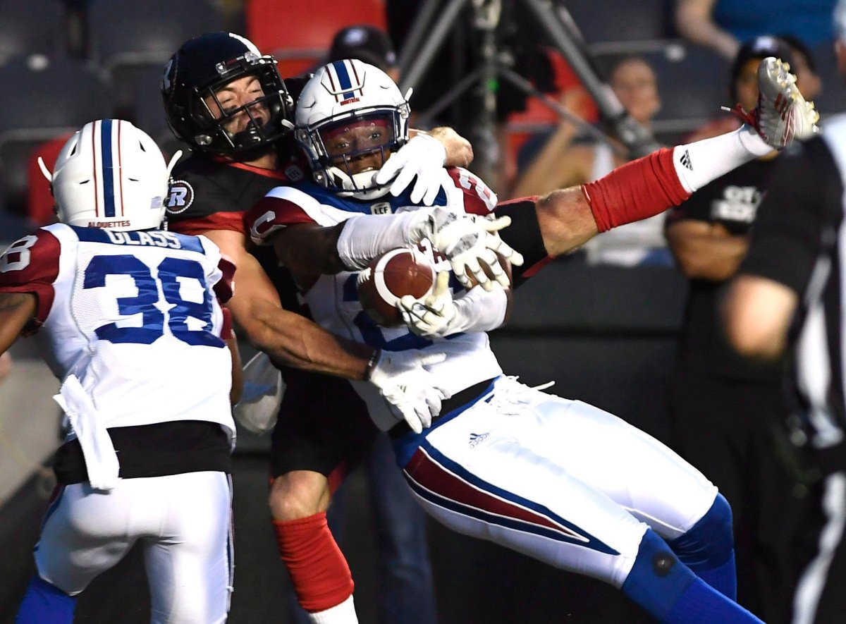 Montreal Alouettes' C.J. Moore (26) prevents Ottawa Redblacks' Seth Coate (75) from catching the ball in the endzone during first half of pre-season CFL action in Ottawa on Thursday, May 31, 2018. The Redblacks have suspended Coate for two games after he tested positive for a banned substance.