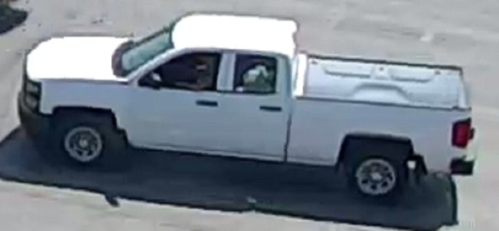 Investigators are looking for the occupants of this vehicle, a white 2014-2015 Chevrolet Silverado, who may have witnessed the crash.
