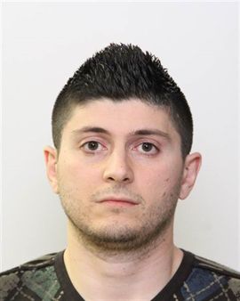 Sinan Hadi is wanted on Canada-wide warrants for convictions of unlawful confinement and sexual assault, Wednesday, Aug. 1, 2018. 