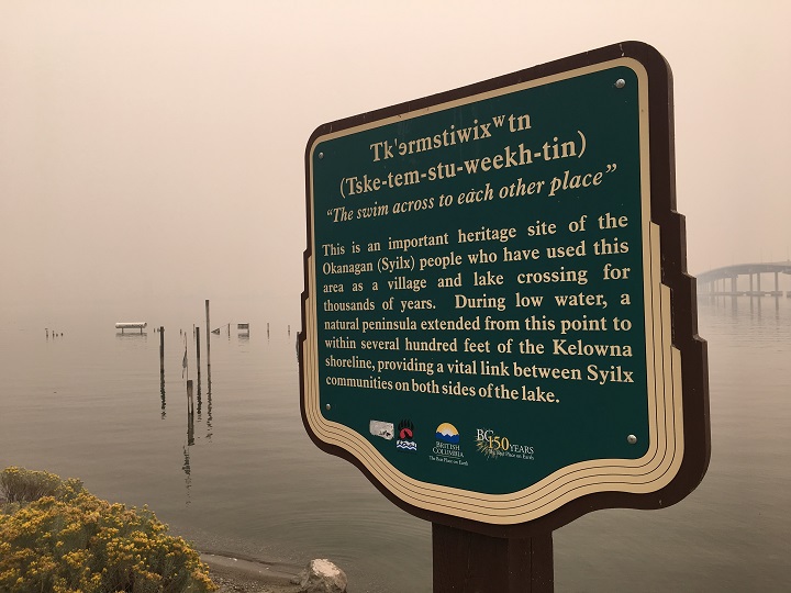 A view from West Kelowna, looking east towards Kelowna, with the W.R. Bennett Bridge to the right. Normally, Kelowna’s downtown core and its beaches would be easily visible. Smoky conditions, however, have clouded that view.