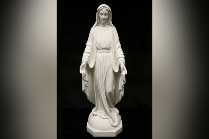 Hamilton police say a statue of the Virgin Mary was stolen from outside a school.