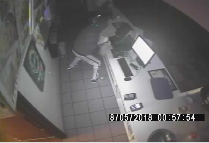 Police say the suspect was wearing a distinctive pair of light coloured pants and distinctive shoes.