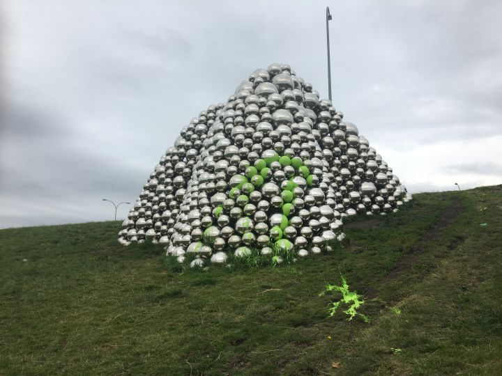 On Saturday morning, the Talus Dome – colloquially known by many Edmontonians as the “Talus balls” – was noticeably different after the stainless steel balls appeared to have had green paint dumped on them.