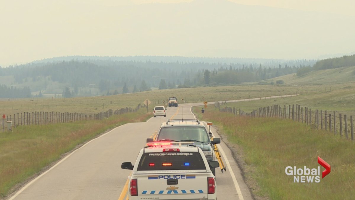 RCMP on scene on Highway 1A in southern Alberta after a tourist was shot on Thursday, Aug. 2.