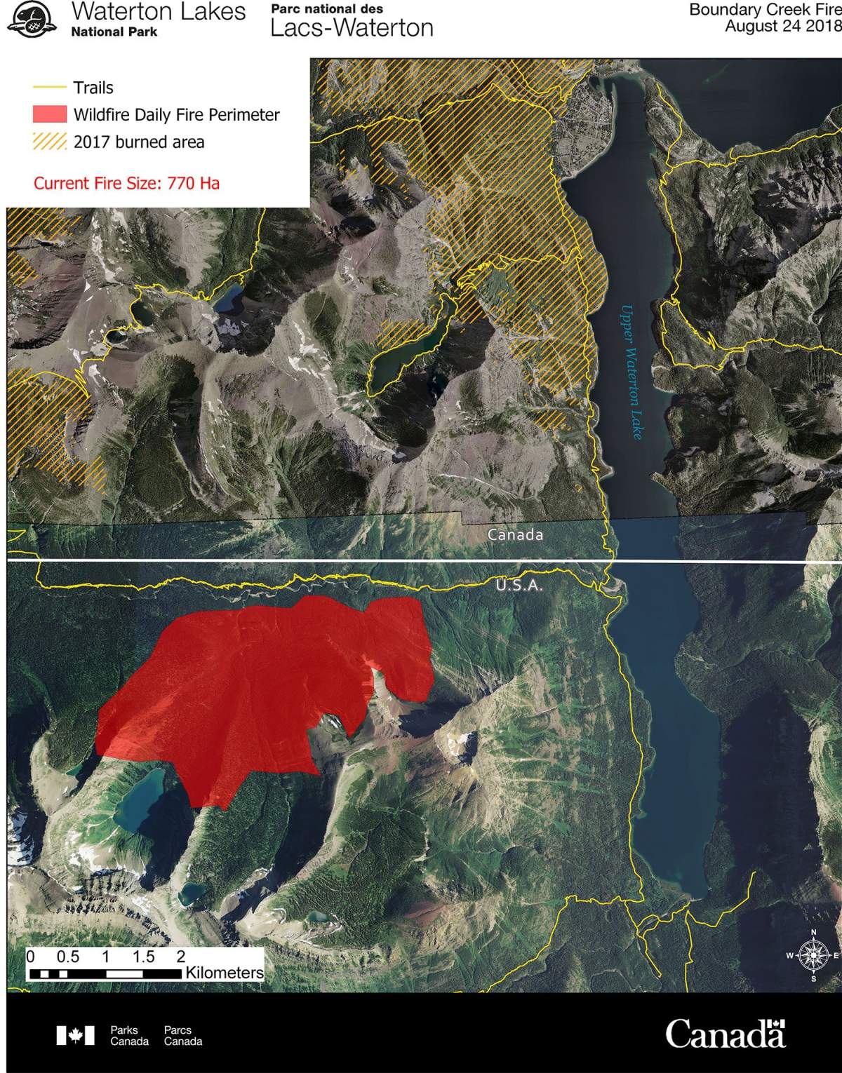 An out of control wildfire burning about five kilometres south of the townsite in Waterton Lakes National Park