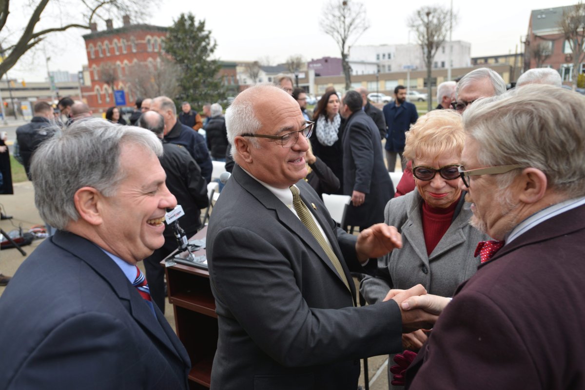 Bergen County freeholders David Ganz, from right, and Joan Voss congratulate Bergen County Sheriff Michael Saudino with county executive Jim Tedesco after Saudino announced his decision to switch to the Democratic party in Hackensack, N.J., Friday, Jan. 15, 2016. 