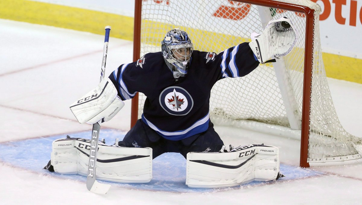 Goaltender Eric Comrie is heading back to Winnipeg after being claimed off waivers from the Detroit Red Wings.