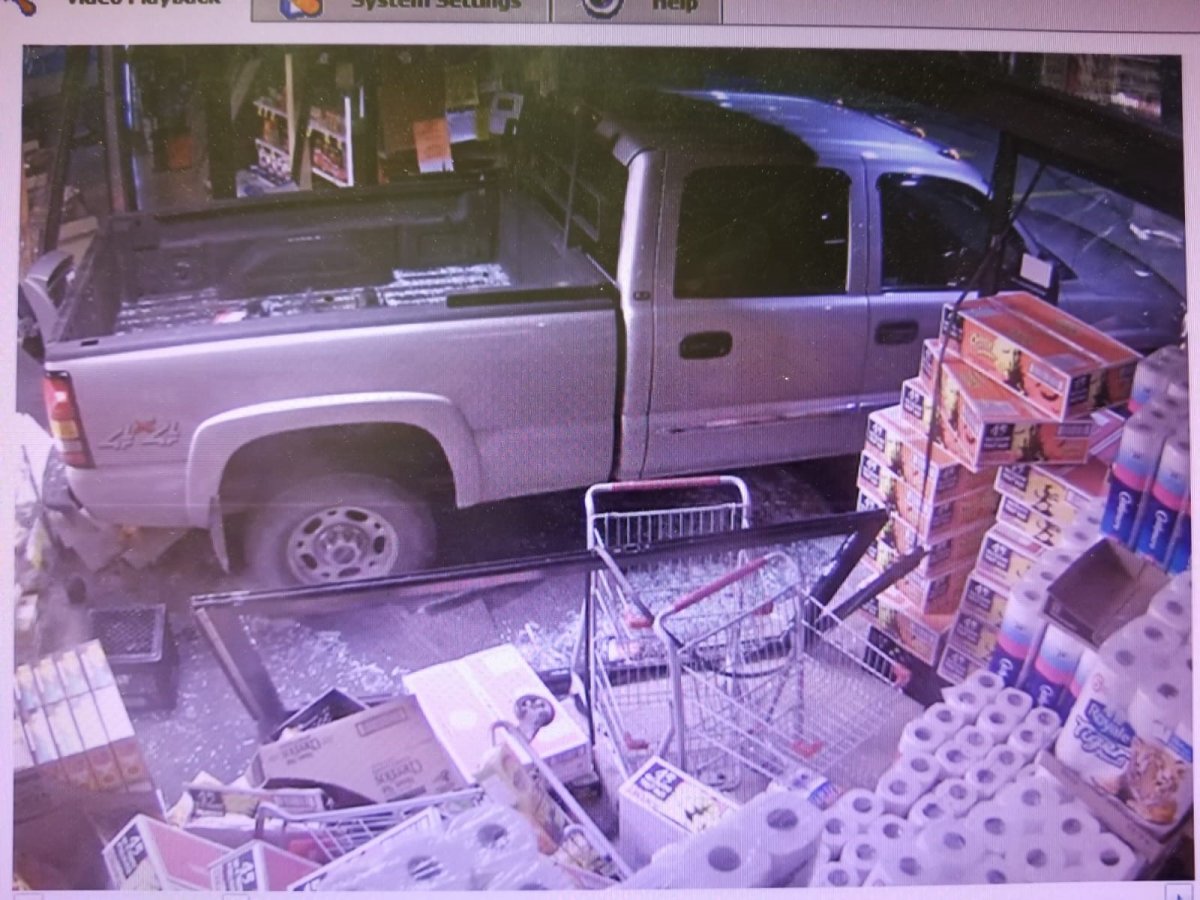 Grey GMC Pickup (said to be stolen) allegedly involved in ATM theft.