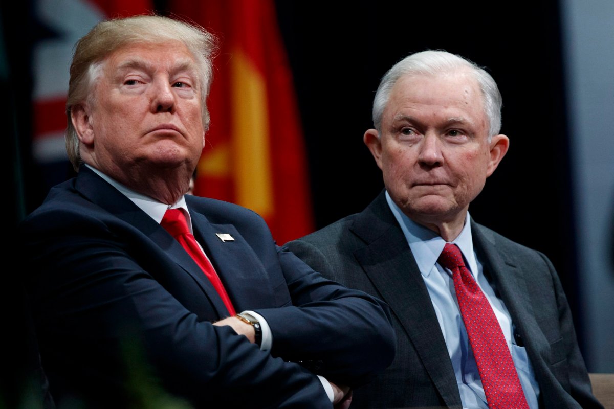 President Donald Trump sits with Attorney General Jeff Sessions during the FBI National Academy graduation ceremony, Friday, Dec. 15, 2017, in Quantico, Va. 