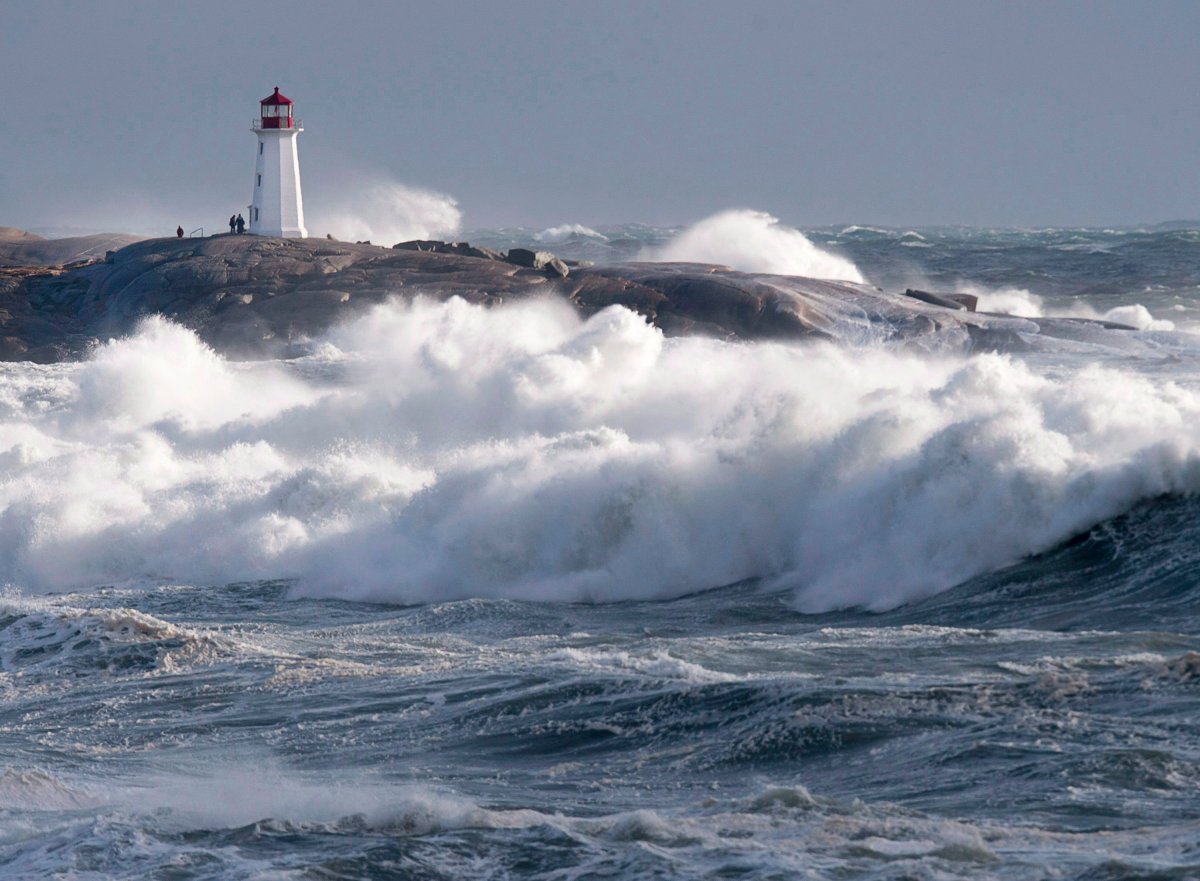 Waves pound the shore at Peggy's Cove, N.S. on Friday, Jan. 5, 2018. Thousands of Nova Scotia residents suddenly found themselves in the dark on Sunday morning, as heavy winds and rain resulted in power outages throughout the province. THE CANADIAN PRESS/Andrew Vaughan.