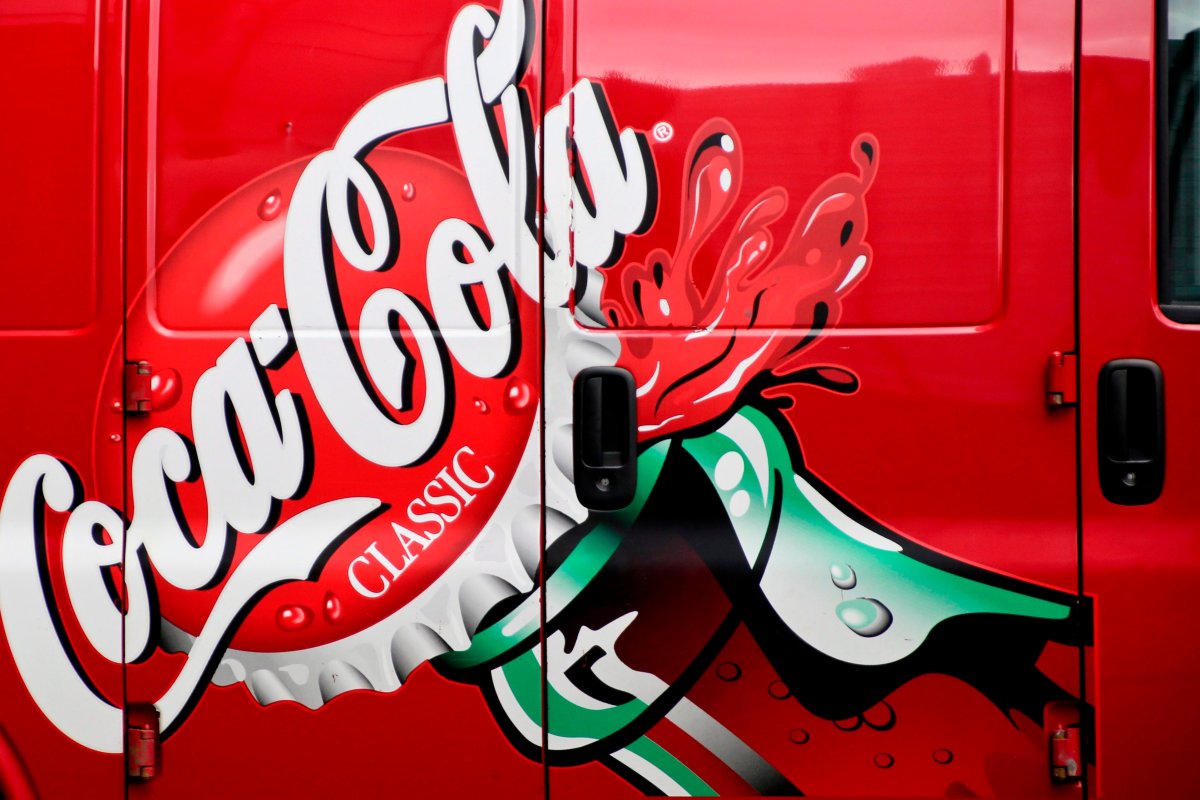 This Feb. 23, 2017, file photo shows a delivery van is painted with artwork for Classic Coca-Cola in downtown Pittsburgh. Coca-Cola Co. reports earnings Tuesday, April 24, 2018.