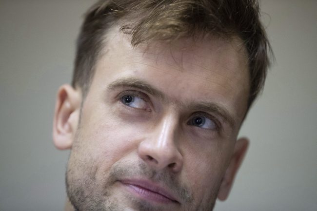 Pyotr Verzilov, a member of the feminist protest group Pussy Riot, attends hearings in a court in Moscow, Russia, Monday, July 23, 2018.

