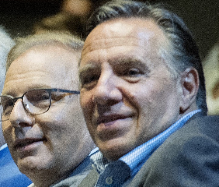From left, Parti Québécois Leader Jean-François Lisée and CAQ Leader François Legault. Both leaders are promising to cut immigration to the province if elected. Sunday, Sept. 16, 2018.