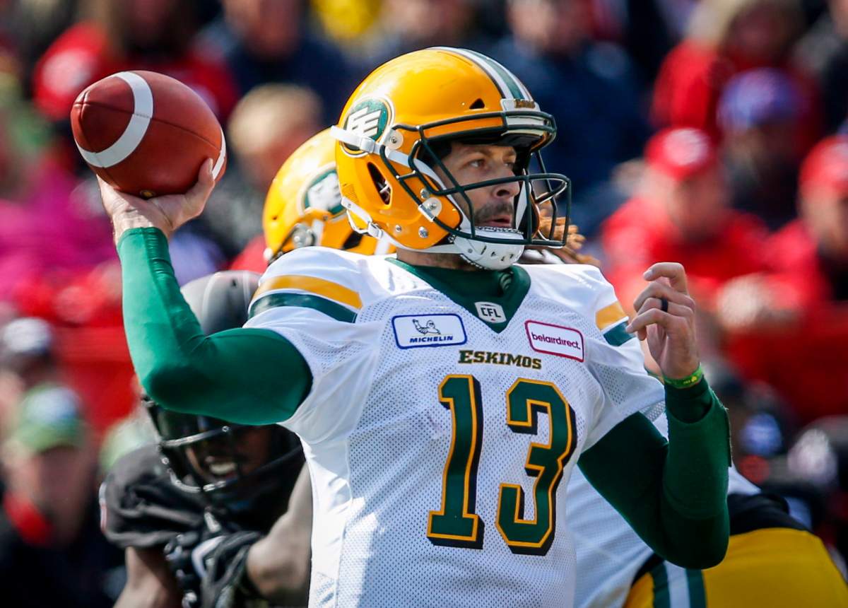 Edmonton Eskimos quarterback Mike Reilly throws the ball during second half CFL football action against the Calgary Stampeders in Calgary, Monday, Sept. 3, 2018.