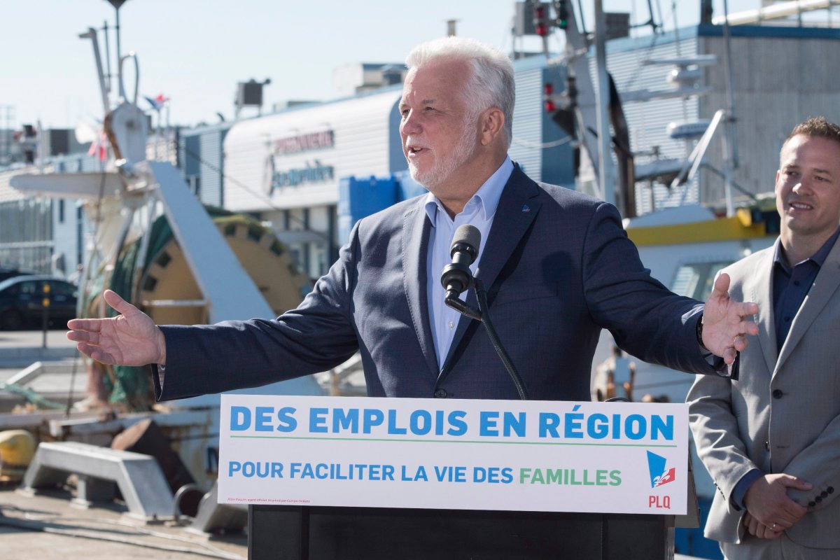 Quebec Liberal Leader Philippe Couillard responds to reporters questions during a news conference Tuesday, September 4, 2018 in Gaspé, Que. 