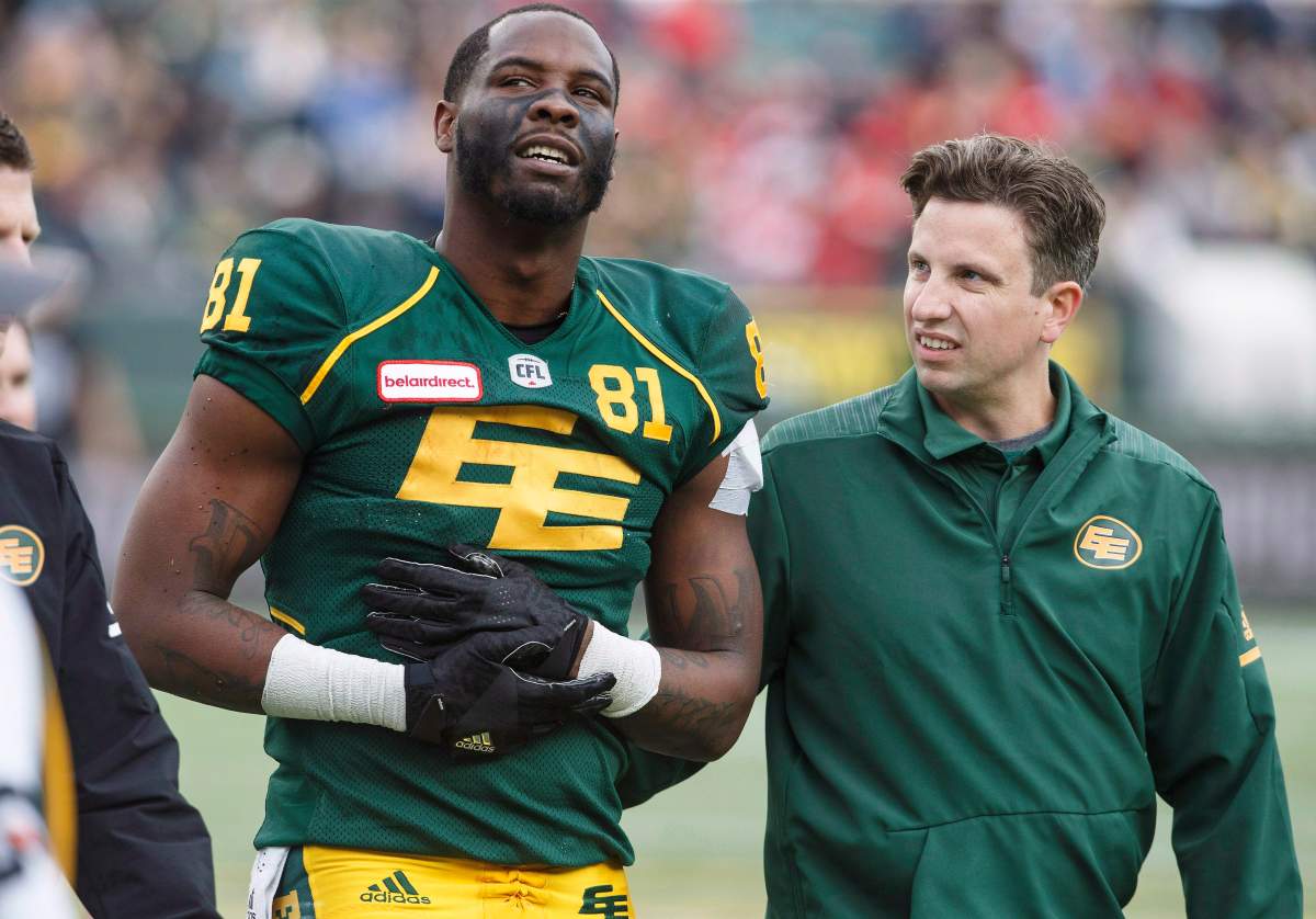 Edmonton Eskimos D'haquille Williams (81) is injured against the Calgary Stampeders during first half CFL action in Edmonton, Alta., on Saturday September 8, 2018. 