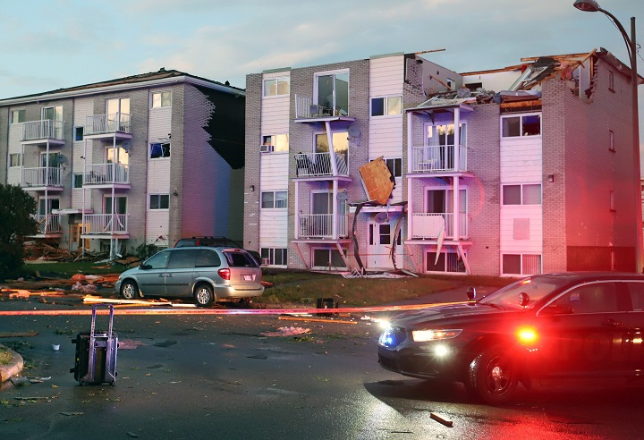 Apartment buildings are shown after a tornado torn roofs off and windows blown out after a tornado caused extensive damage to a Gatineau, Quebec neighbourhood forcing hundreds of families to evacuate their homes on Friday, September 21, 2018. Global News.