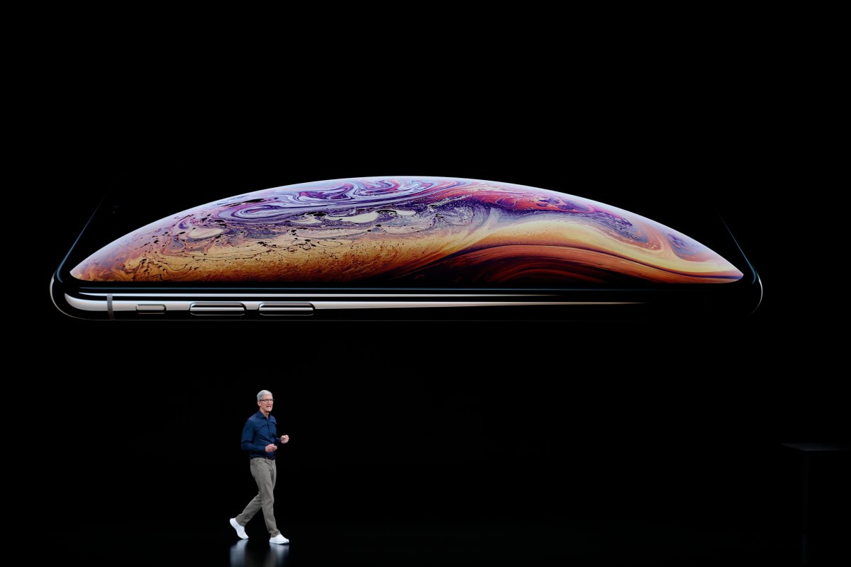 Tim Cook, CEO of Apple, speaks on stage for an Apple Inc product launch in Cupertino.