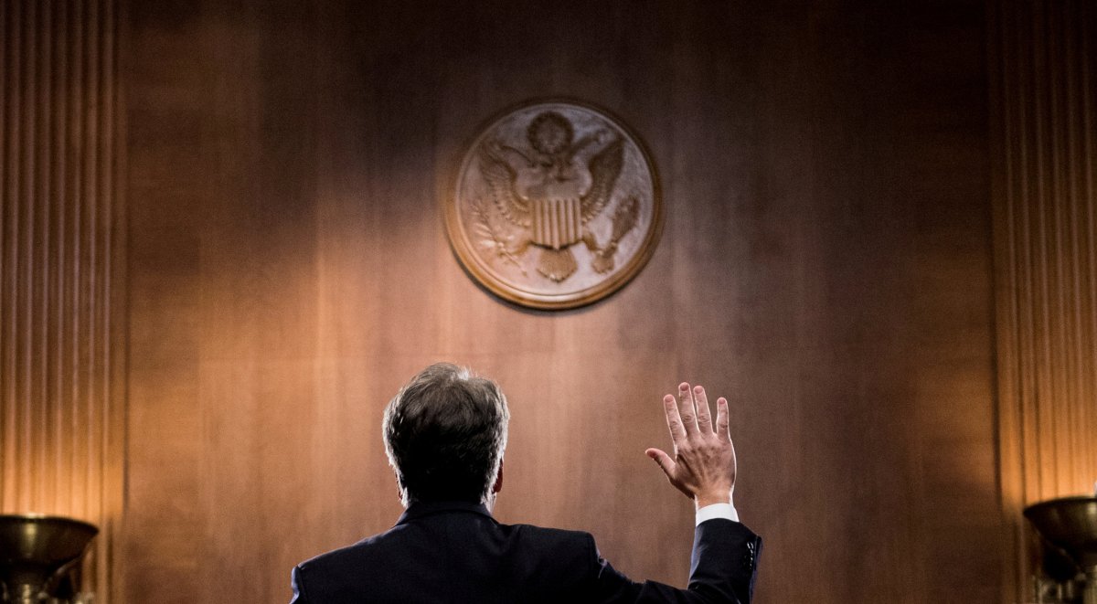 Judge Brett Kavanaugh is sworn in before testifying before the U.S. Senate Judiciary Committee on Capitol Hill in Washington, U.S., September 27, 2018. 