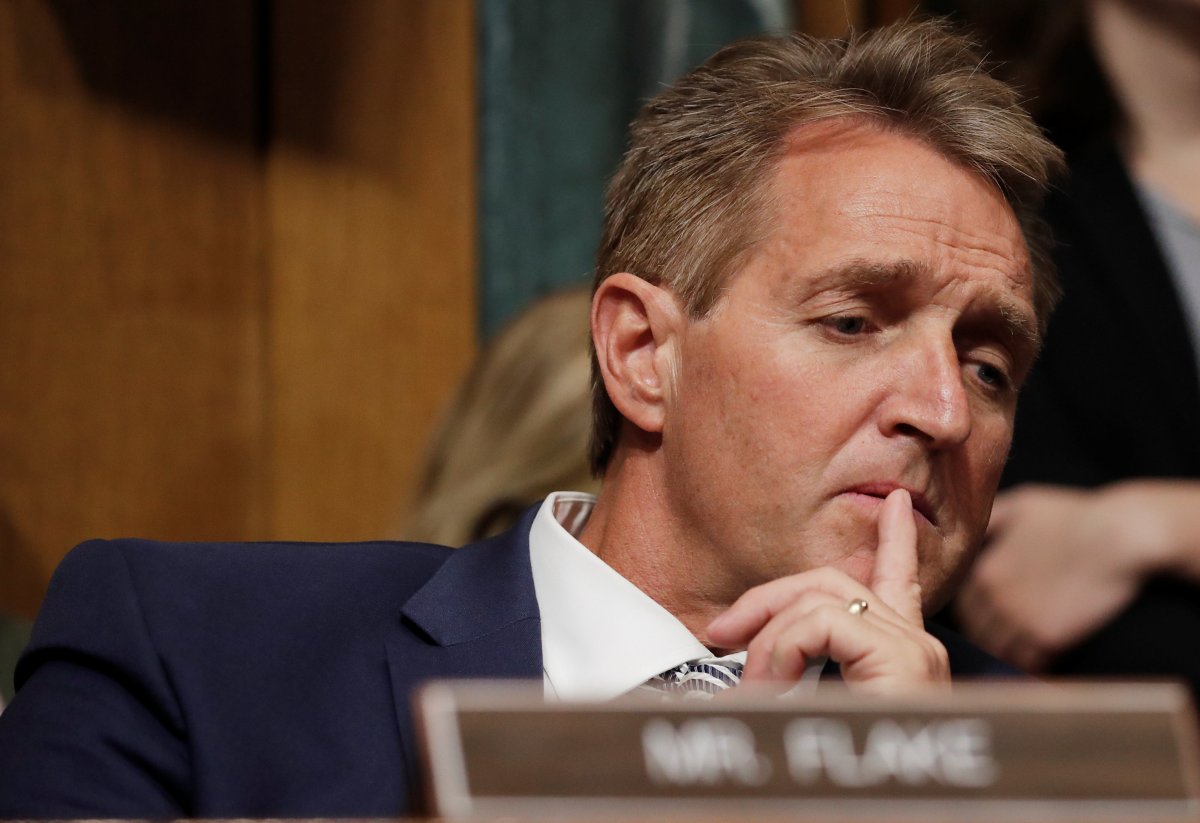 U.S. Senator Jeff Flake (R-AZ) listens as members of the Senate Judiciary Committee meet to vote on the nomination of judge Brett Kavanaugh to be a U.S. Supreme Court associate justice on Capitol Hill in Washington, U.S., September 28, 2018.