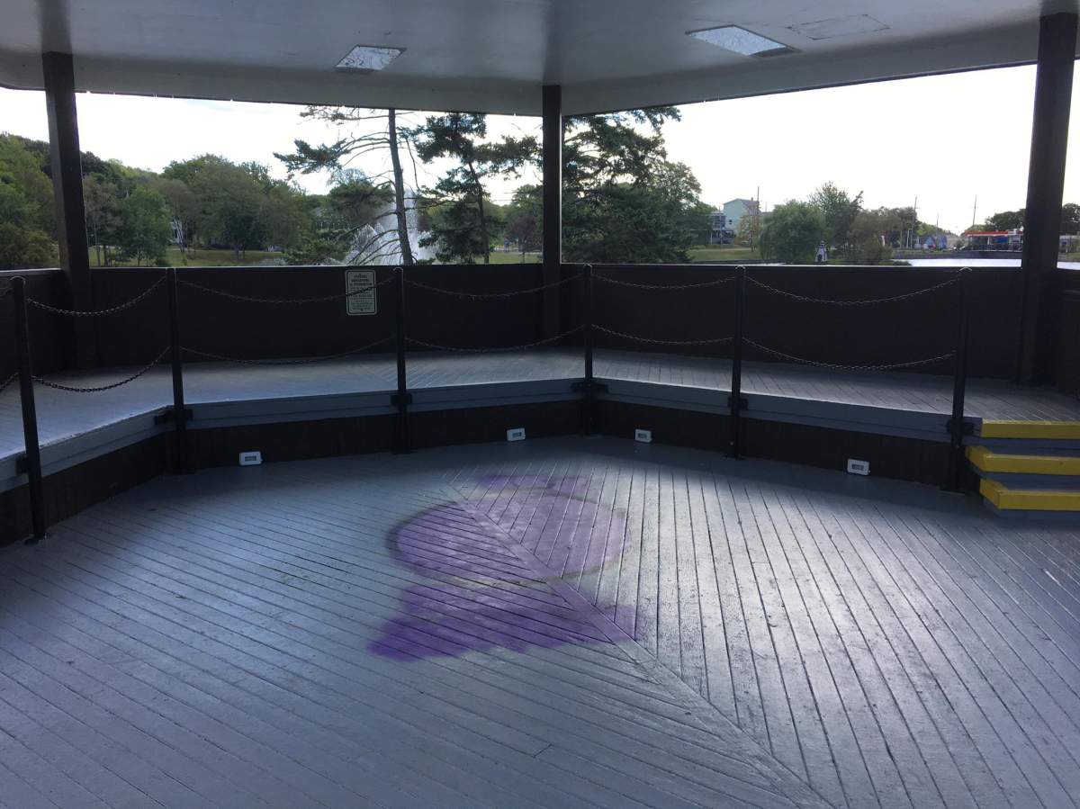 Police covered the graphic and offensive graffiti with purple paint.