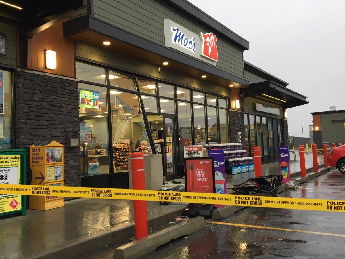 Edmonton police investigate an ATM robbery at a west end Mac's, Wednesday, Sept. 12, 2018. 