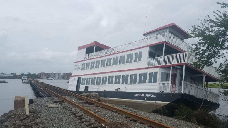 A riverboat was left stranded on a railroad track after Hurricane Florence hit New Bern, N.C., in this photo from Sept. 16, 2018.
