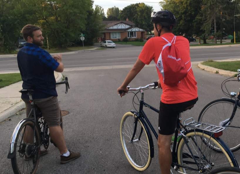 Ben Cowie, left, lead a bike ride for media Monday morning.