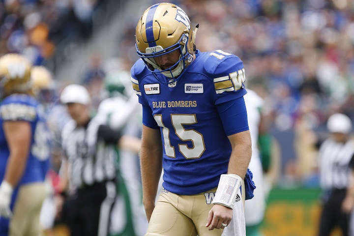 Winnipeg Blue Bombers quarterback Matt Nichols (15) walks off the field after throwing an interception during first half CFL action against the Saskatchewan Roughriders in the 15th annual Banjo Bowl in Winnipeg Saturday, September 8, 2018. 