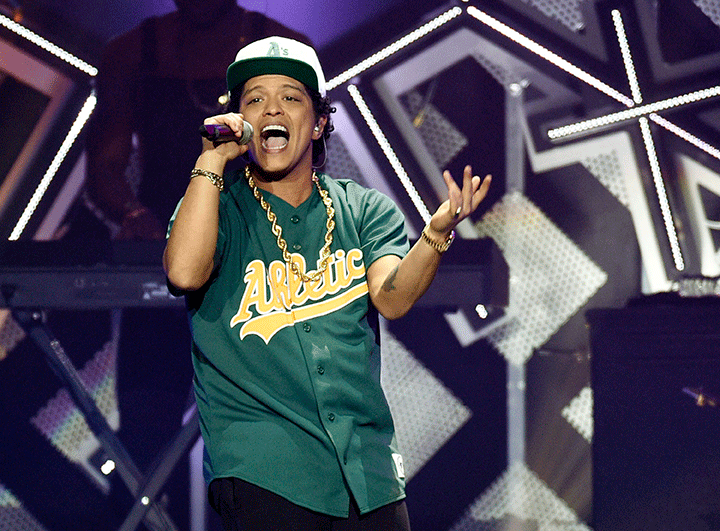 In this Dec. 2, 2016 file photo, Bruno Mars performs at the 2016 Jingle Ball at Staples Center in Los Angeles. 