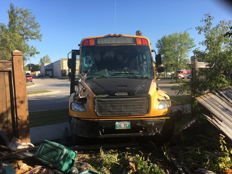 The bus went through the fence of a homeowner's backyard on Warde Avenue.