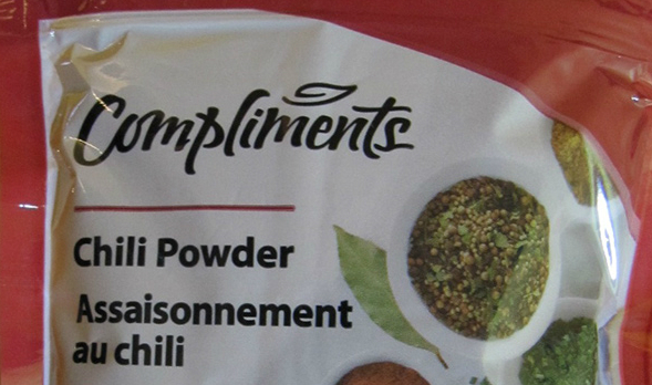 A package of Compliments chili powder.