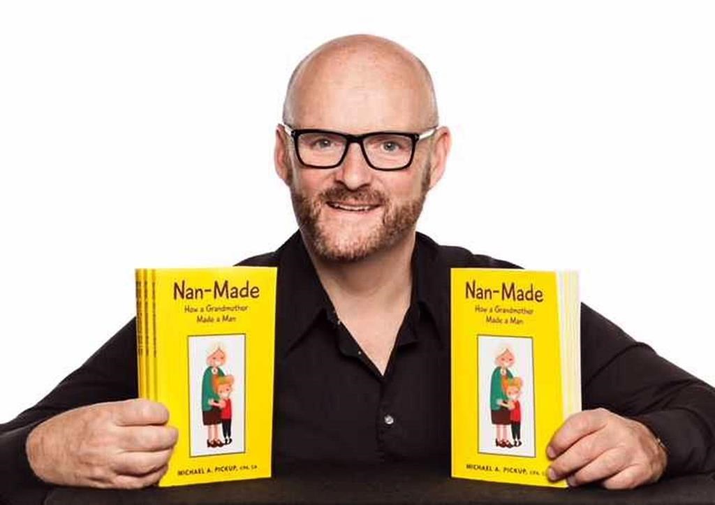 Michael Pickup poses with copies of his book "Nan-Made" in this undated handout photo. Michael Pickup describes his grandmother as a superhero, a friend, and "everything and more than people traditionally think of a grandmother." Though he's more well-known for writing reports as Nova Scotia's auditor general, Pickup recently decided to try his hand at authorship, penning a 150-page book about lessons he learned from Nan Pickup.