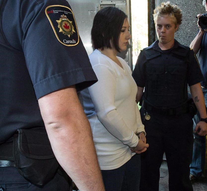 Terri-Lynne McClintic, convicted in the death of 8-year-old Woodstock, Ont., girl Victoria Stafford, is escorted into court in Kitchener, Ont., on Wednesday, September 12, 2012 for her trial in an assault on another inmate while in prison.