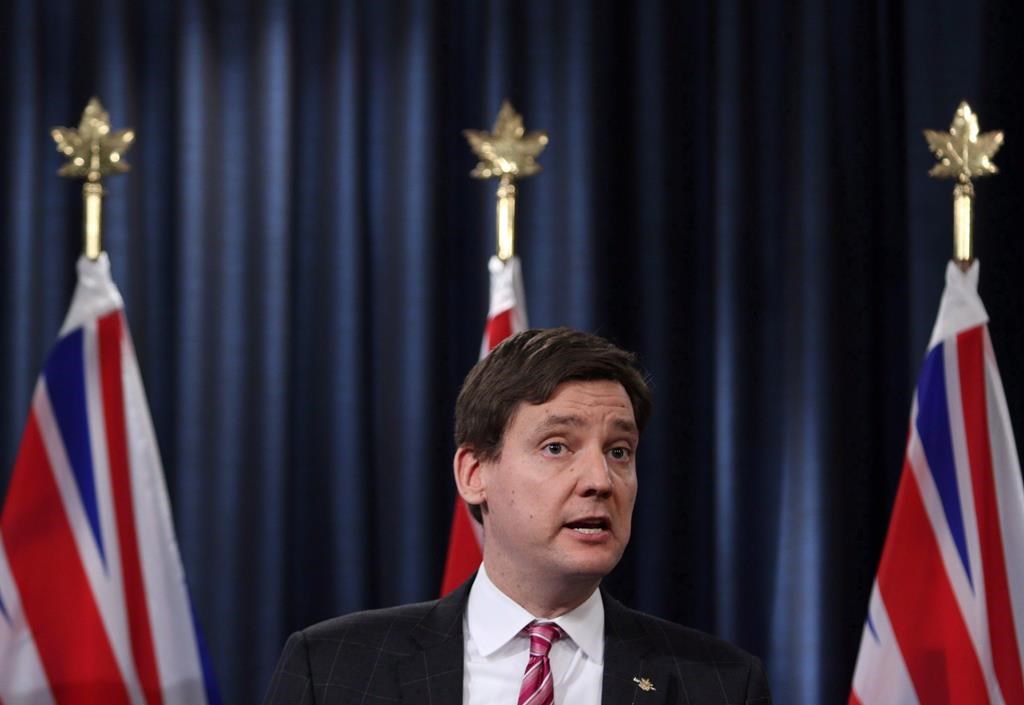 Attorney General David Eby answers questions from media during a press conference at the Legislature in Victoria, B.C., on Tuesday February 6, 2018.THE CANADIAN PRESS/Chad Hipolito.