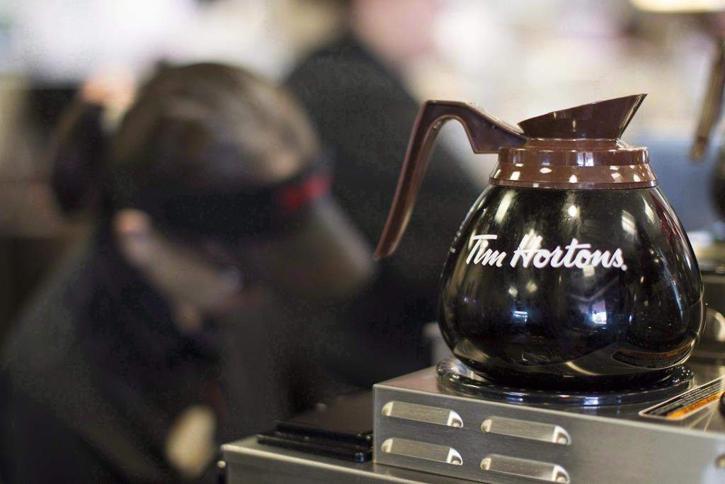 Freshly-brewed coffee sits on a hot plate in a Tim Hortons outlet in Oakville, Ont. on Monday, September 16, 2013. THE CANADIAN PRESS/Chris Young.