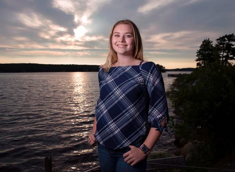 Stella Bowles, a teenage environmental crusader, stands by the LaHave River near her home in Upper LaHave, N.S. on Thursday, Aug. 23, 2018. 