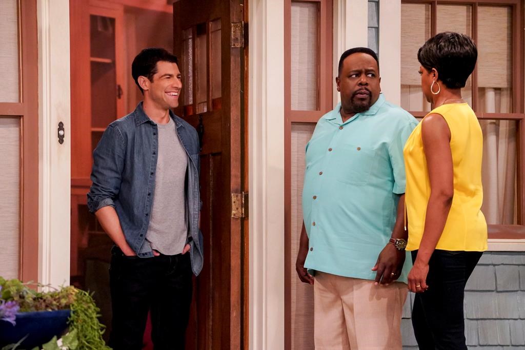 “The Neighborhood” cast members Max Greenfield, left to right, as Dave Johnson, Cedric the Entertainer as Calvin Butler and Tichina Arnold, as Tina Butler. THE CANADIAN PRESS/HO-CBS, Bill Inoshita,