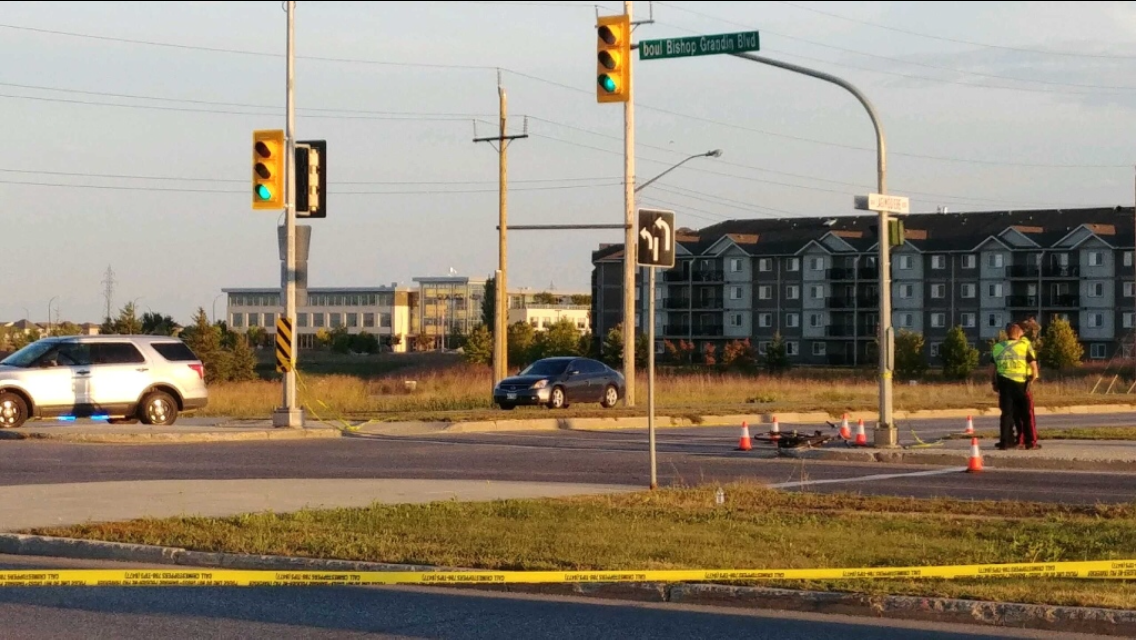 A cyclist died after being hit by a vehicle near Bishop Grandin Boulevard Tuesday.