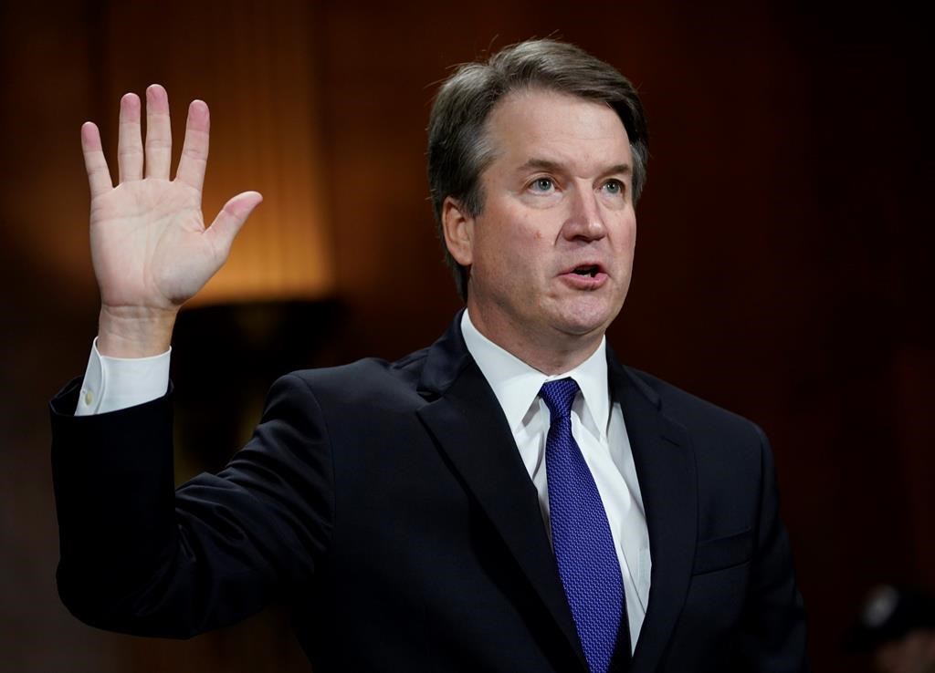FILE - Judge Brett Kavanaugh is sworn in to testify before the Senate Judiciary Committee on Capitol Hill in Washington, Thursday, Sept. 27, 2018. (AP Photo/Andrew Harnik, Pool).