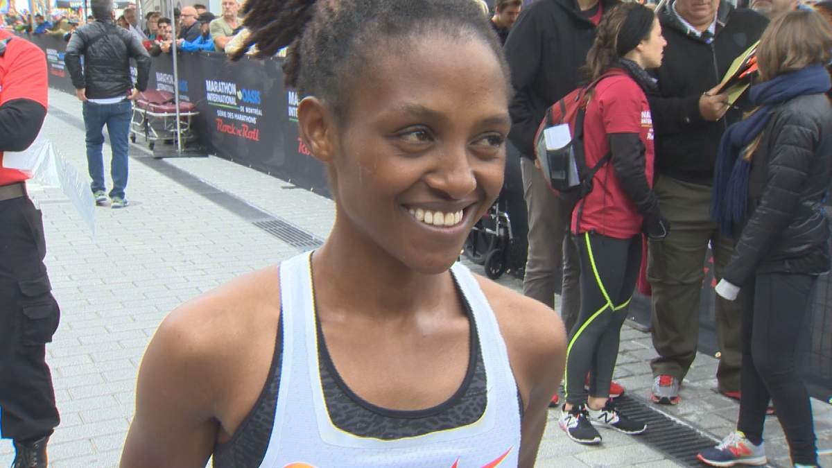Salome Nyirarukundo, 20, speaks to reporters after winning the Montreal marathon. Sunday, Sept. 23, 2018.