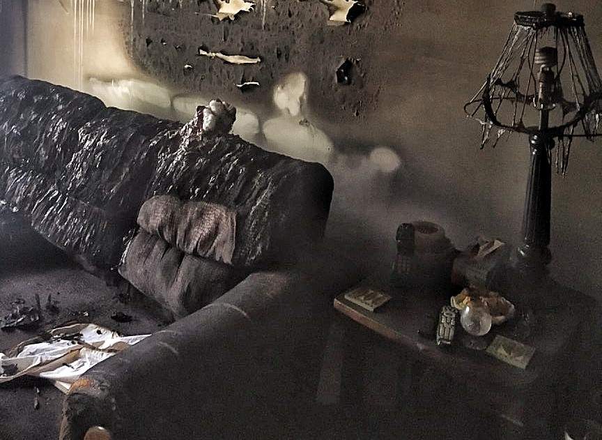 The gutted remains of their living room