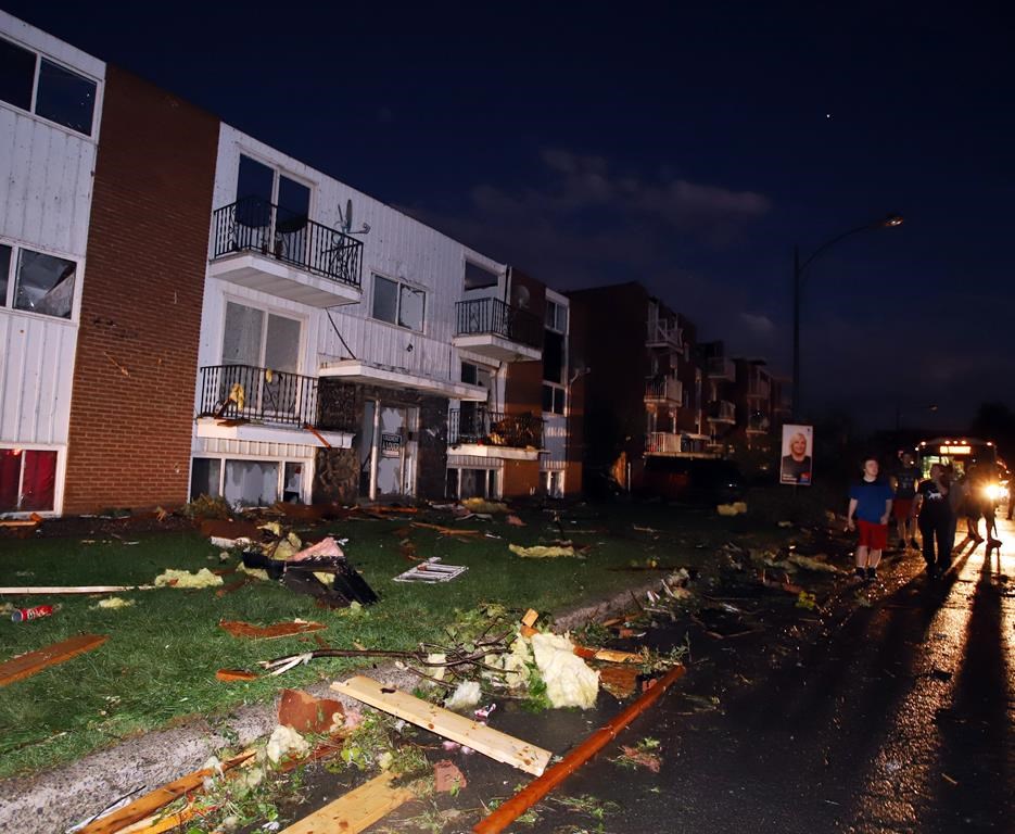 Damaged apartment buildings are shown after a tornado caused extensive damage to a Gatineau, Quebec neighbourhood forcing hundreds of families to evacuate their homes on Friday, September 21, 2018. THE CANADIAN PRESS/Fred Chartrand