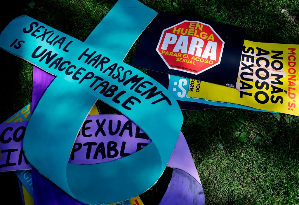 Signs used by McDonald’s employees and other fast food chain workers to protest against sexual harassment in the workplace are displayed on the ground on September 18, 2018 in Chicago, Illinois