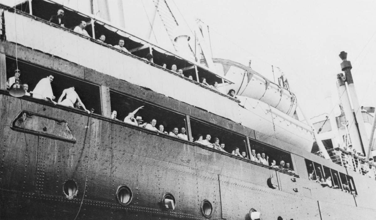 Despairing German-Jewish refugees, their hopes of sanctuary in Havana dashed when Cuban immigration officials refused them entry, are shown waving goodbye to friends and relatives as the German Liner St. Louis, prepared to leave Havana harbour for an unknown destination. A wave of suicides was feared among the 907 passengers, they might be forced to return to Nazi Germany.