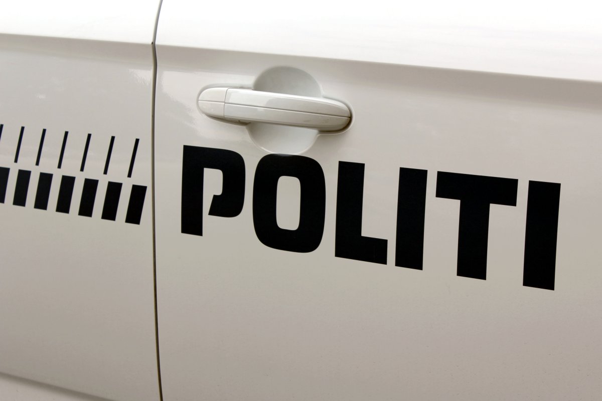 Inscription detail of a police car in Copenhagen, Denmark.