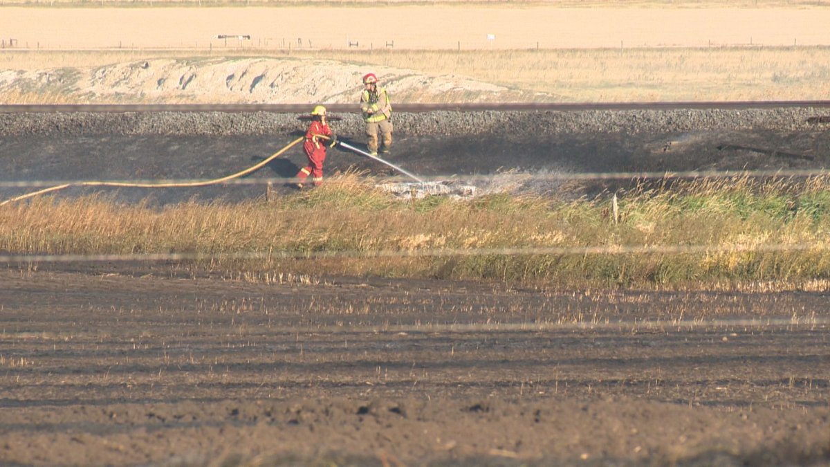The fire at Township Road 290 and Range Road 253 was contained but smoldering by 6 p.m.